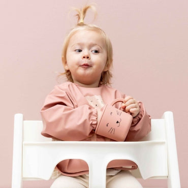 Trixie Bavoir à manches Mrs. Cat rose