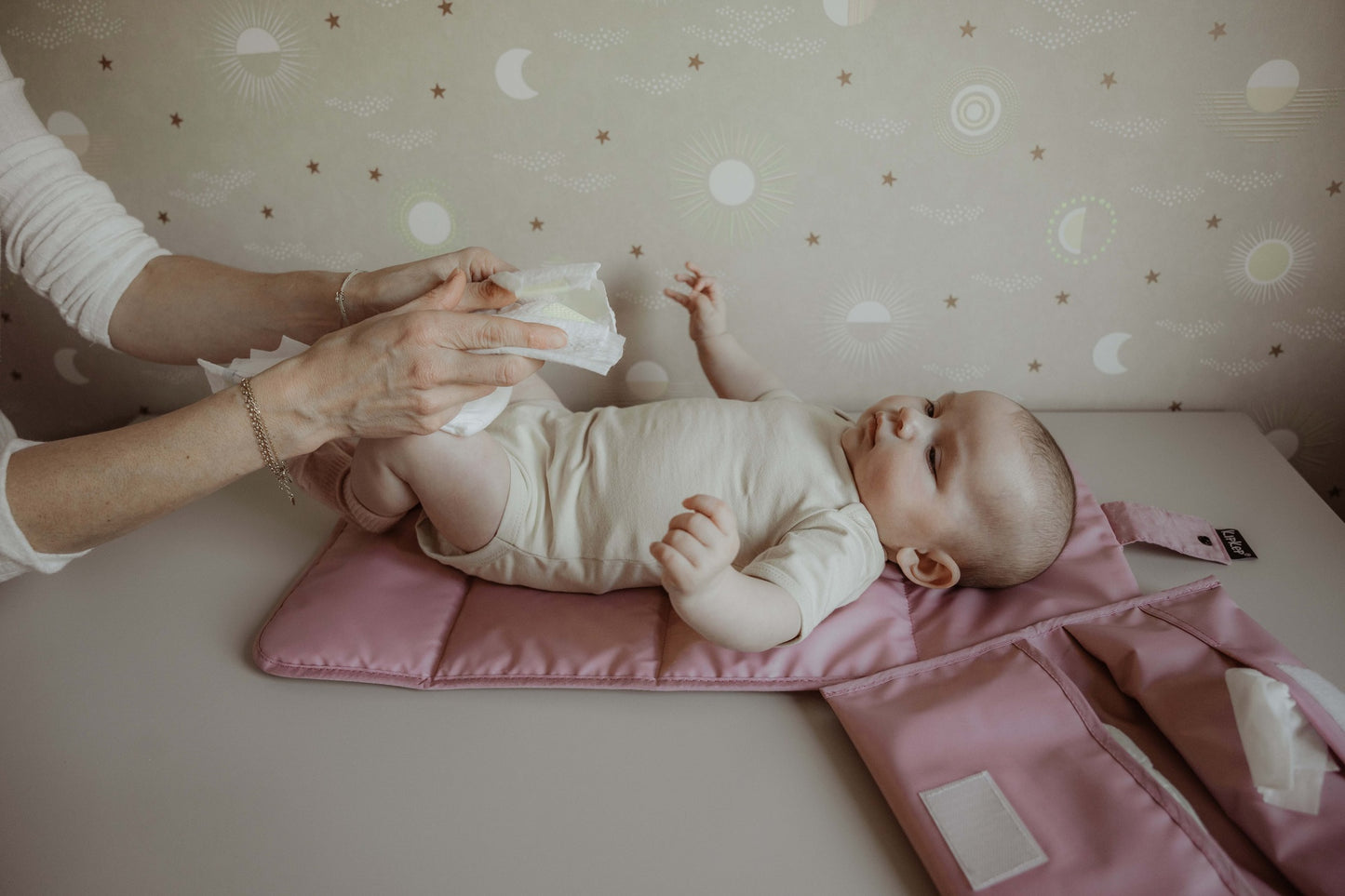 KipKep Verzorgingsmatje + etui Nappers paars