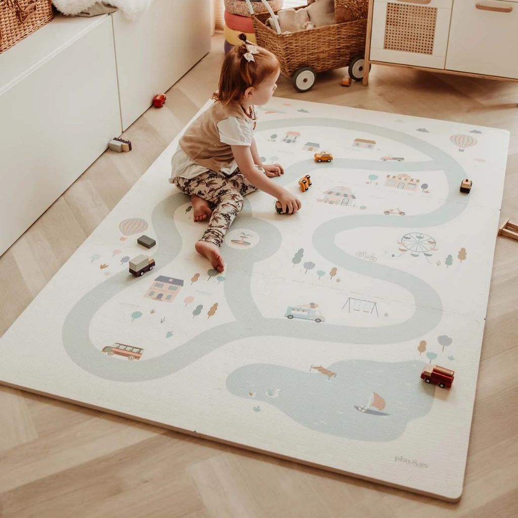 Play and Go Tiloo village puzzlemat, storage box, and mini house