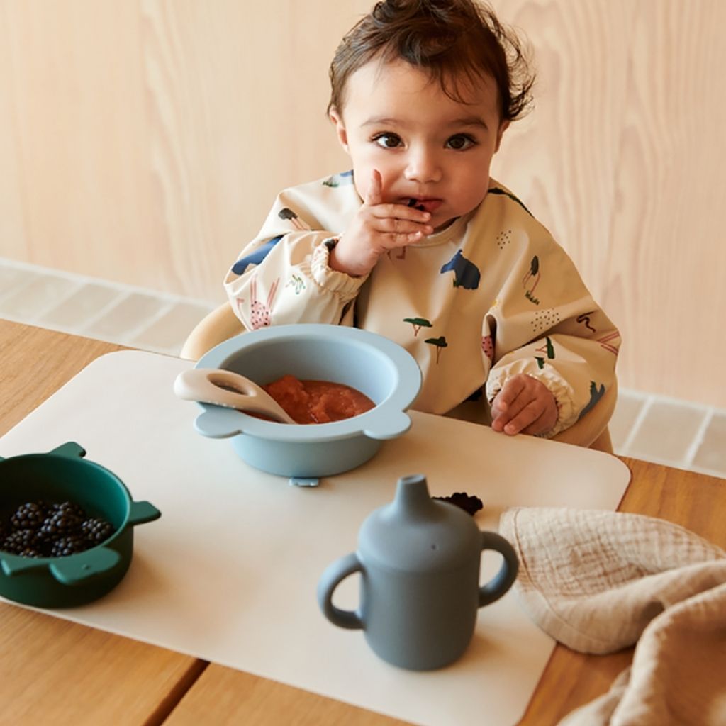 Liewood Bavoir à manches Merle Safari Sandy