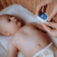 kindje met ademhalingsapparaat dreambaby