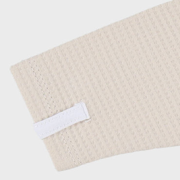 Noukie's Pyjama met voet beige