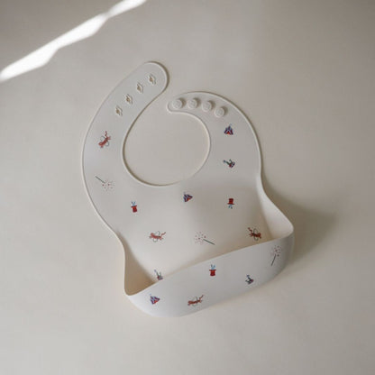 Mushie Bavoir en silicone Circus multicolore