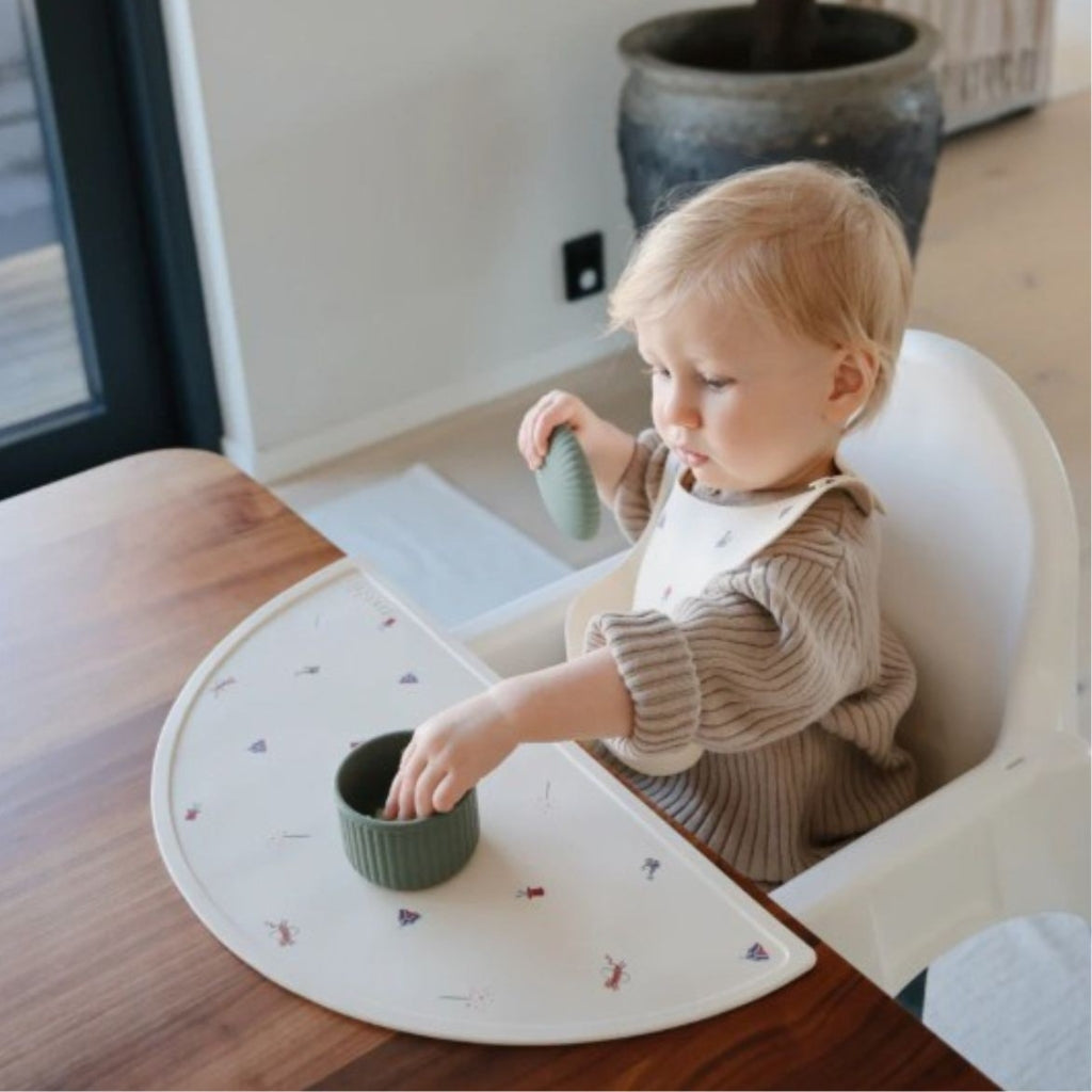 Mushie Bavoir en silicone Circus multicolore