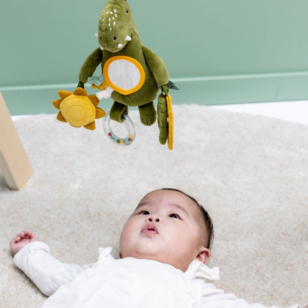 Trixie Baby Jouet d’éveil suspendu Mr. Dino vert